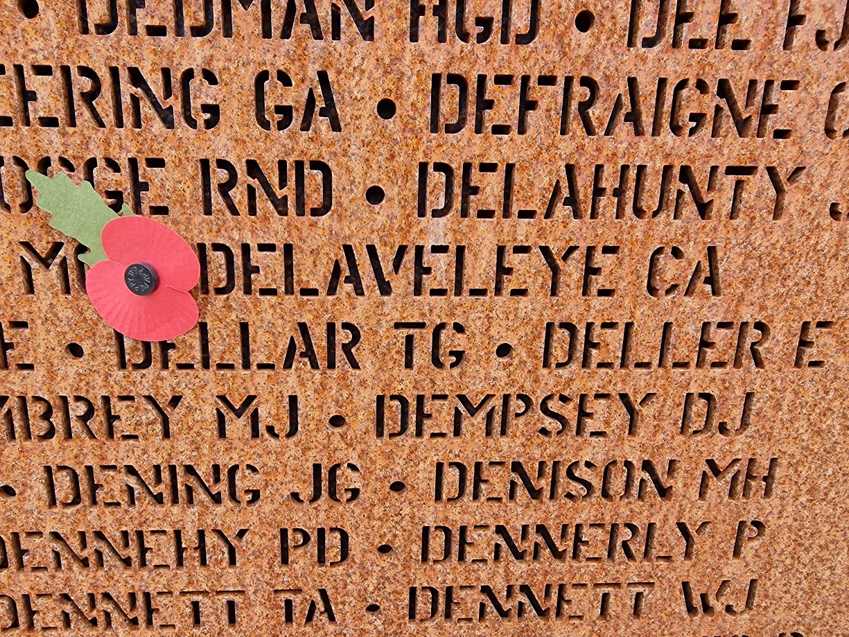 Wall of Names with poppy