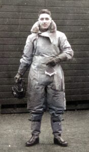 Black and white photo of Dickie Dent in his WW2 flying suit