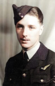 Headshot photo of a young man, Dickie Dent, in RAF uniform