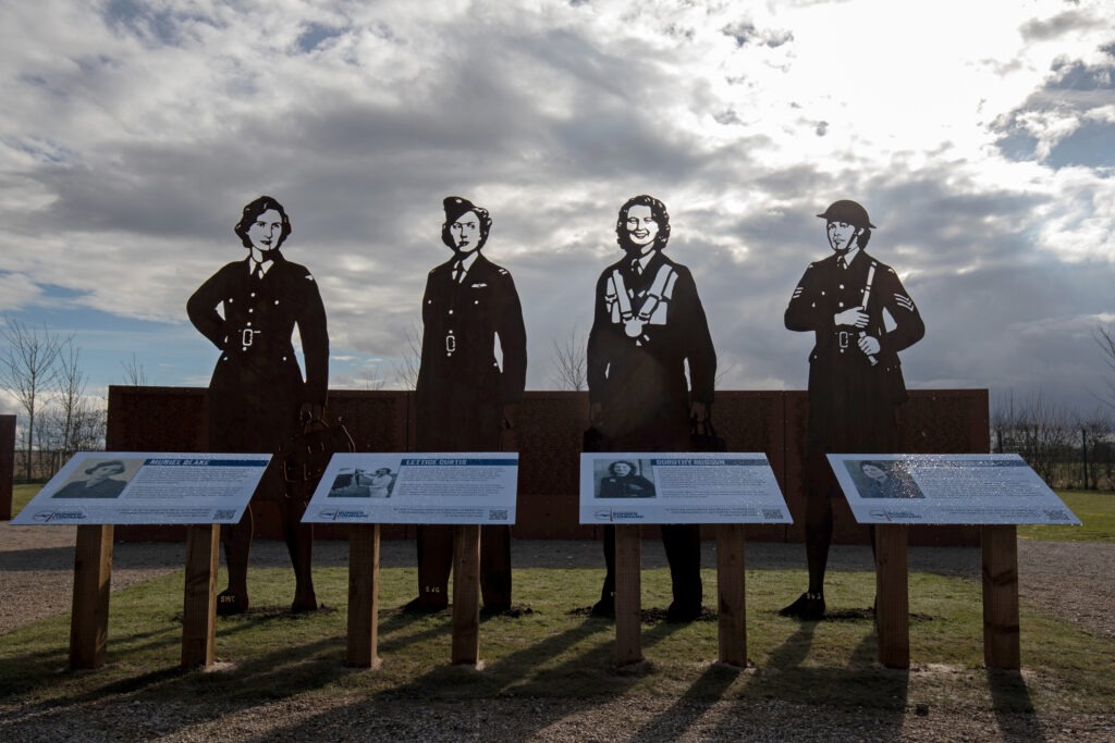 Women in War- colour photos of 4 silhouettes of women
